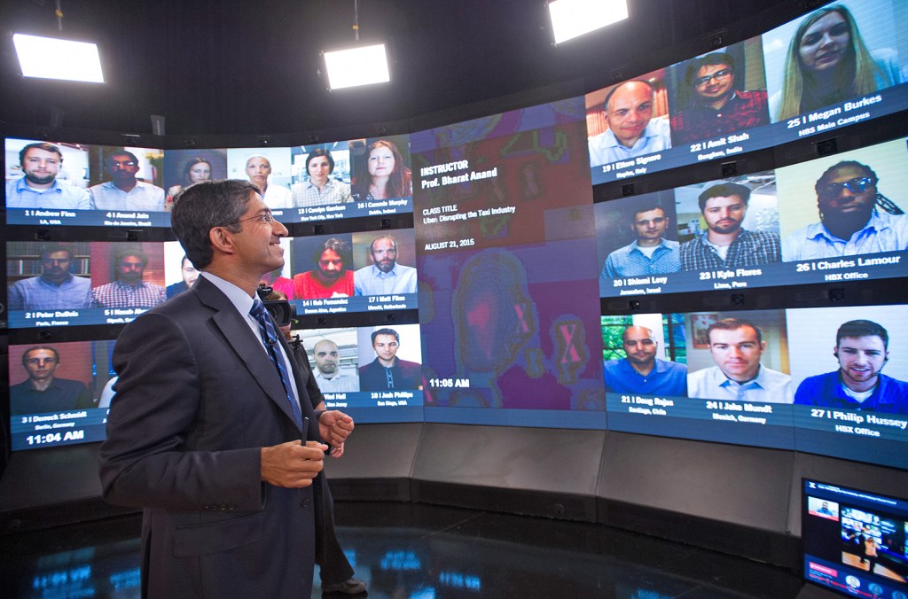 Harvard Business School professor and faculty chair of HBX Bharat Anand demonstrates the online classroom that allows real-time interaction between professors and students from around the world. The Associated Press