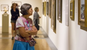 Regina Tremblay of Naples explores one of the galleries at the Portland Museum of Art, where attendance is up over last year thanks in part to a strong summer. Ben McCanna/Staff Photographer