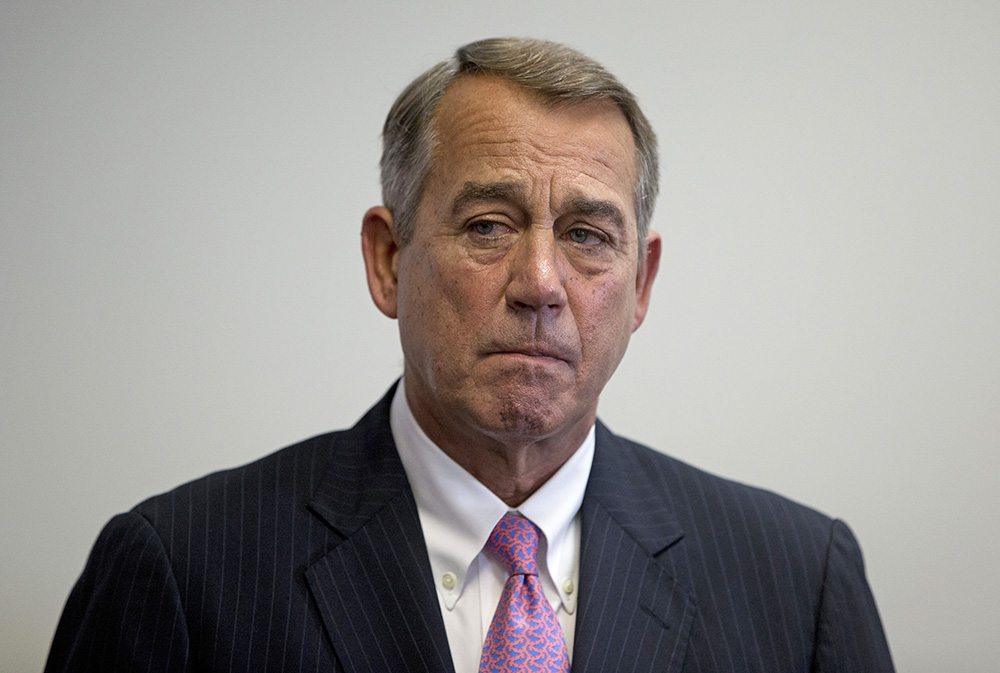 Outgoing House Speaker John Boehner of Ohio stands to the side during a news conference on Capitol Hill recently. The Associated Press