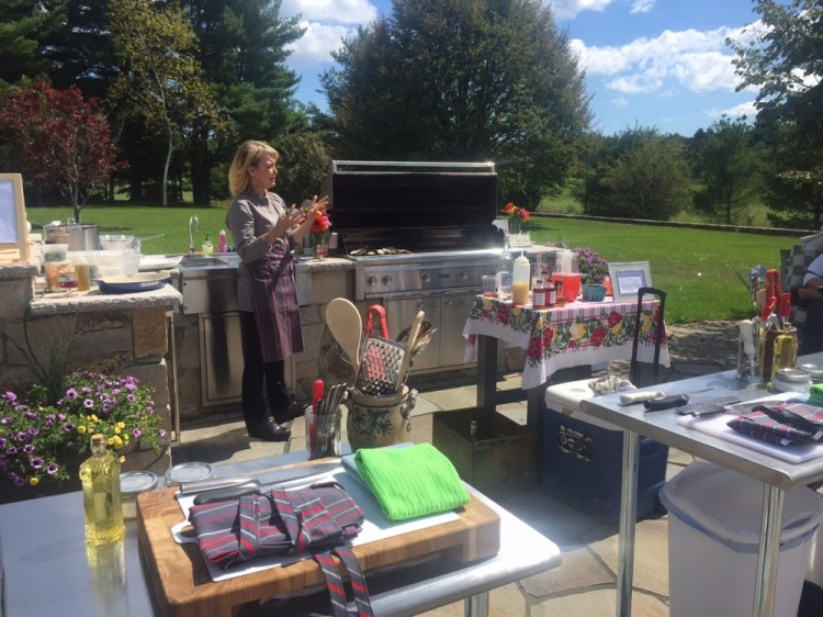 Chef Shannon Bard prepares to teach a class in the outdoor kitchen at Mirabelle House