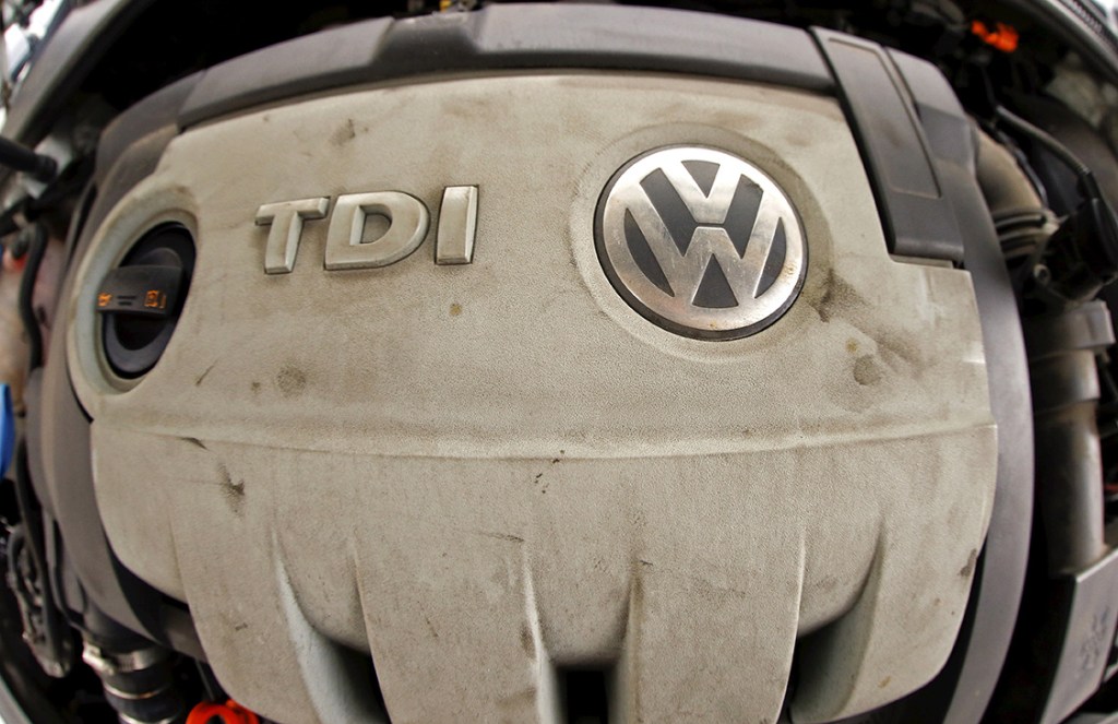 Volkswagen's logo is seen on a TDI diesel engine of its EOS car in Zurich, Switzerland. In theory, EPA fines and penalties for the emissions rigging scheme carried out by the company could, in theory, total about $18 billion.  Reuters