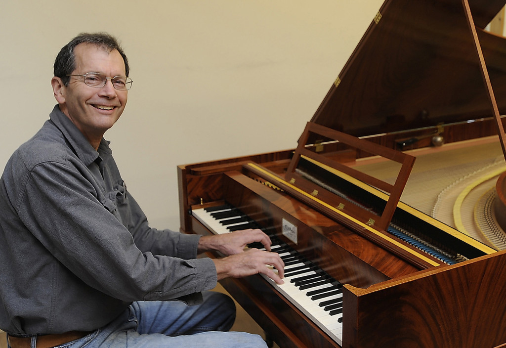 Portrait of Forte piano maker Rod Regier at one of his Early Music Pianos he made in his Freeport workshop with Kris Carr. Gordon Chibroski/Staff Photographer
