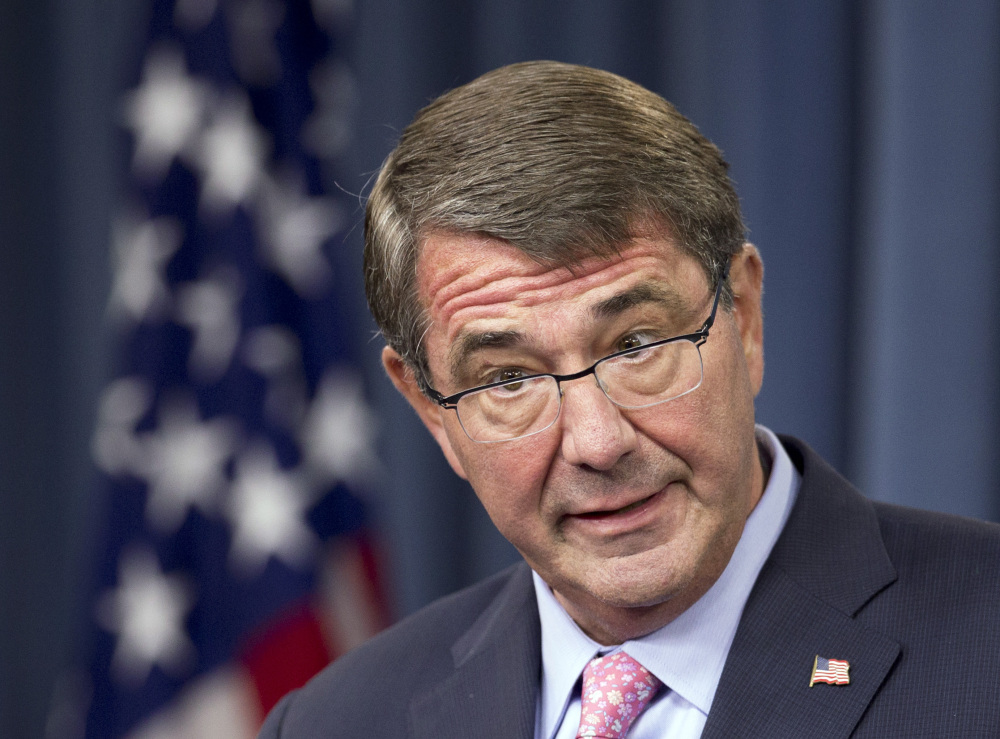 Defense Secretary Ash Carter speaks to reporters during a news conference at the Pentagon on Wednesday. The House passed a defense policy bill that President Obama has threatened to veto.