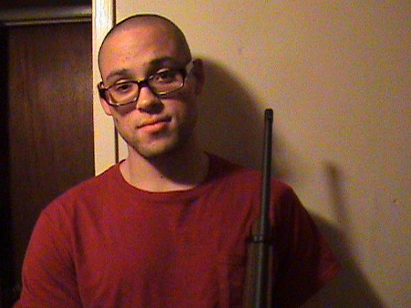 This undated photo from a MySpace page that appeared to belong to Chris Harper-Mercer shows him holding a rifle. Authorities identified Mercer as the gunman who went on a deadly shooting rampage at Umpqua Community College in Roseburg, Ore., on Thursday.