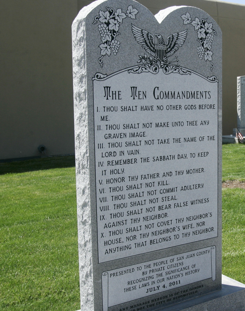 This Ten Commandments monument stands outside City Hall in Bloomfield, N.M. municipality that wants to keep a 6-foot-tall Ten Commandments monument outside city hall is asking a federal appeals court to overturn a judge’s ruling deeming the display unconstitutional. They’ll make their case Wednesday, Sept. 30, 2015, before the 10th Circuit Court of Appeals in Denver. (Jon Austria/The Daily Times via AP) MANDATORY CREDIT