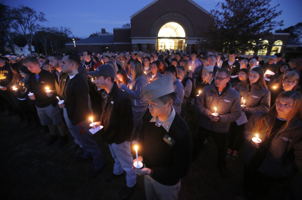 Hundreds of students, faculty and alumni attend a vigil Tuesday at Maine Maritime Academy in Castine, the alma mater of four Mainers aboard the lost El Faro: Capt. Michael Davidson of Windham, Michael Holland of Wilton, and Danielle Randolph and Dylan Meklin, both of Rockland.