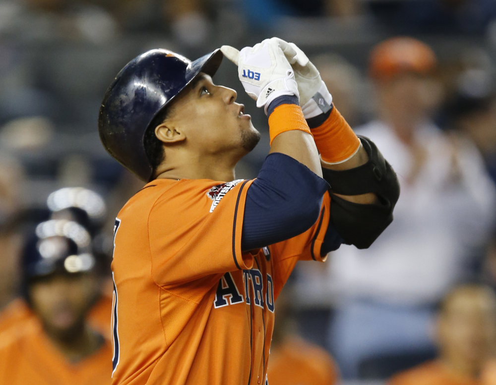 The Astros’ Carlos Gomez hits a solo home run in the fourth inning of Tuesday night’s American League wild card game. Houston went on to a 3-0 win and a spot in the AL Division Series.