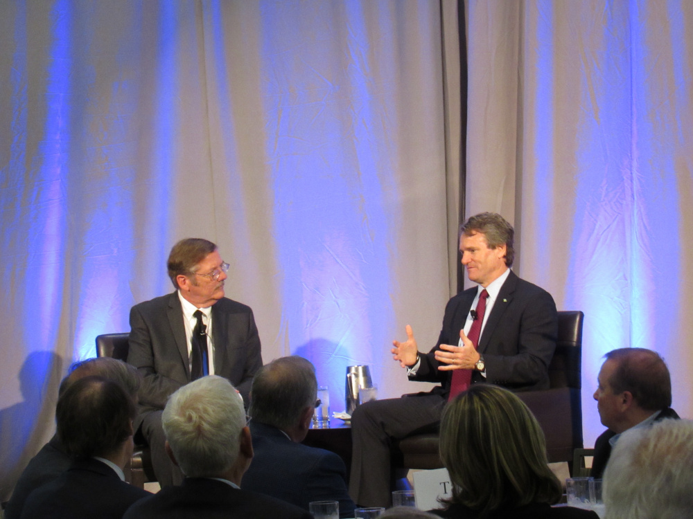 Portland Regional Chamber of Commerce CEO Chris Hall, left, interviews Bank of America CEO Brian Moynihan on Thursday in Portland before a group of 150 local business leaders.