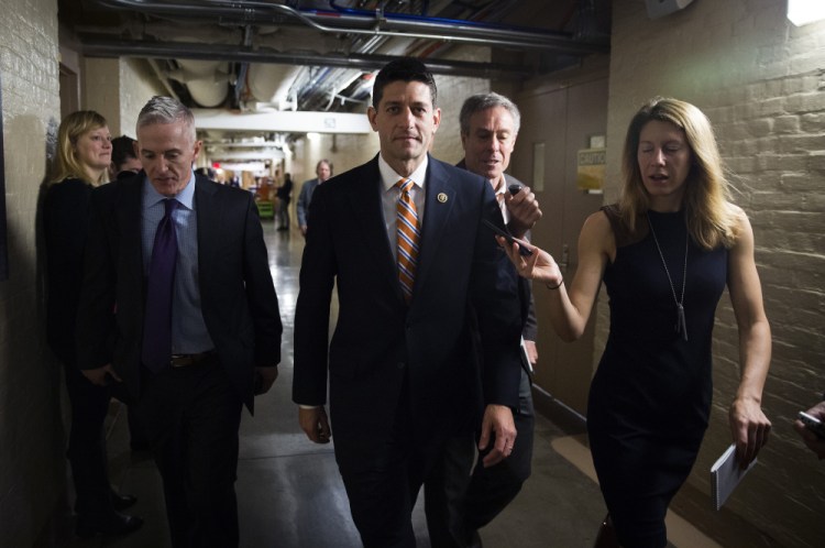 Rep. Paul Ryan, R-Wis., center, and Rep. Trey Gowdy, R-S.C., arrive for a House Republican meeting on Capitol Hill  on Friday. The pressure is on Ryan to run for House speaker.