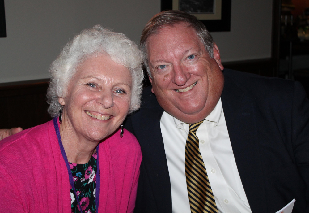 Sally Hennessey, director of March of Dimes program services, with board member Jim Croft.