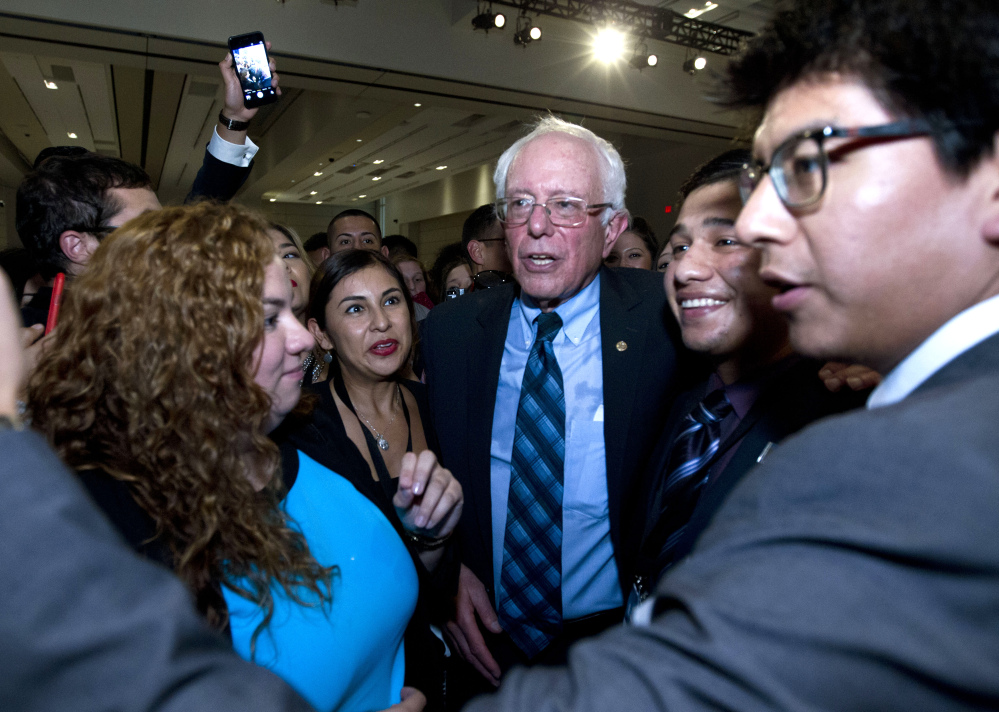 Democratic presidential candidate Sen. Bernie Sanders, I-Vt. greets people after he spoke at Congressional Hispanic Caucus Institute Public Policy Conference at Washington Convention Center, Wednesday, Oct. 7, 2015, in Washington. ( AP Photo/Jose Luis Magana)
