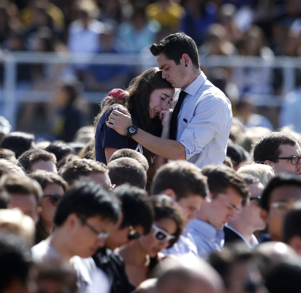Memorial services like this one at the University of California, Santa Barbara, in 2014 are becoming more common. But U.S. colleges and universities vary widely in how they train their staff and students on what to do if there’s a gunman on the loose.