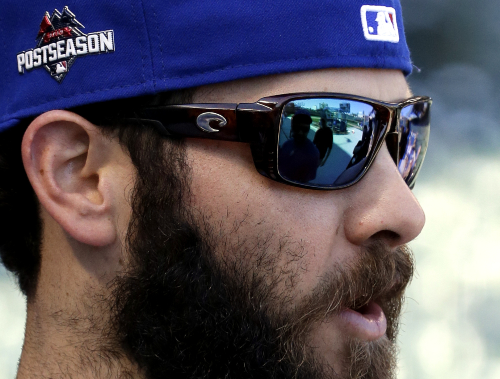 Jake Arrieta has been razor-sharp all season, fanning 236 batters in 229 innings and compiling a 22-6 record.