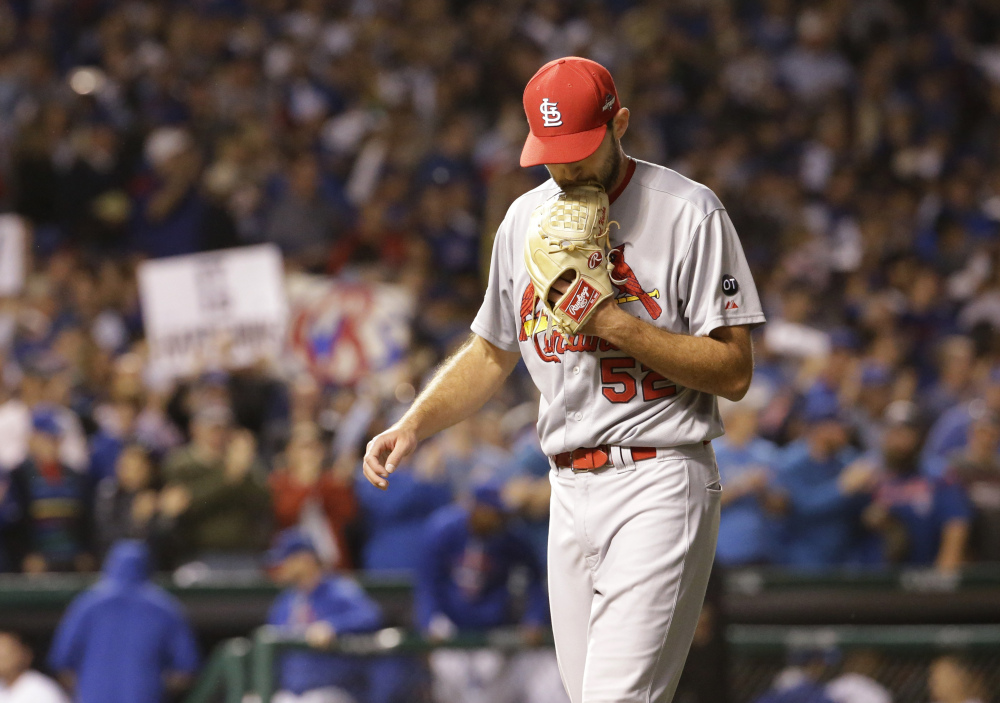 Cardinals starter Michael Wacha is relieved with one out in the fifth inning. Wacha had trouble keeping the ball in the park, giving up three home runs to the Cubs.