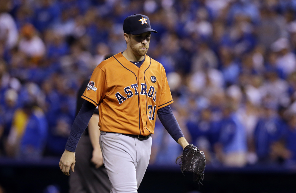 Astros starting pitcher Collin McHugh walks to the dugout after being taken out of the game in the fifth inning, an inning in which Kansas City scored three runs and took the lead for good.
