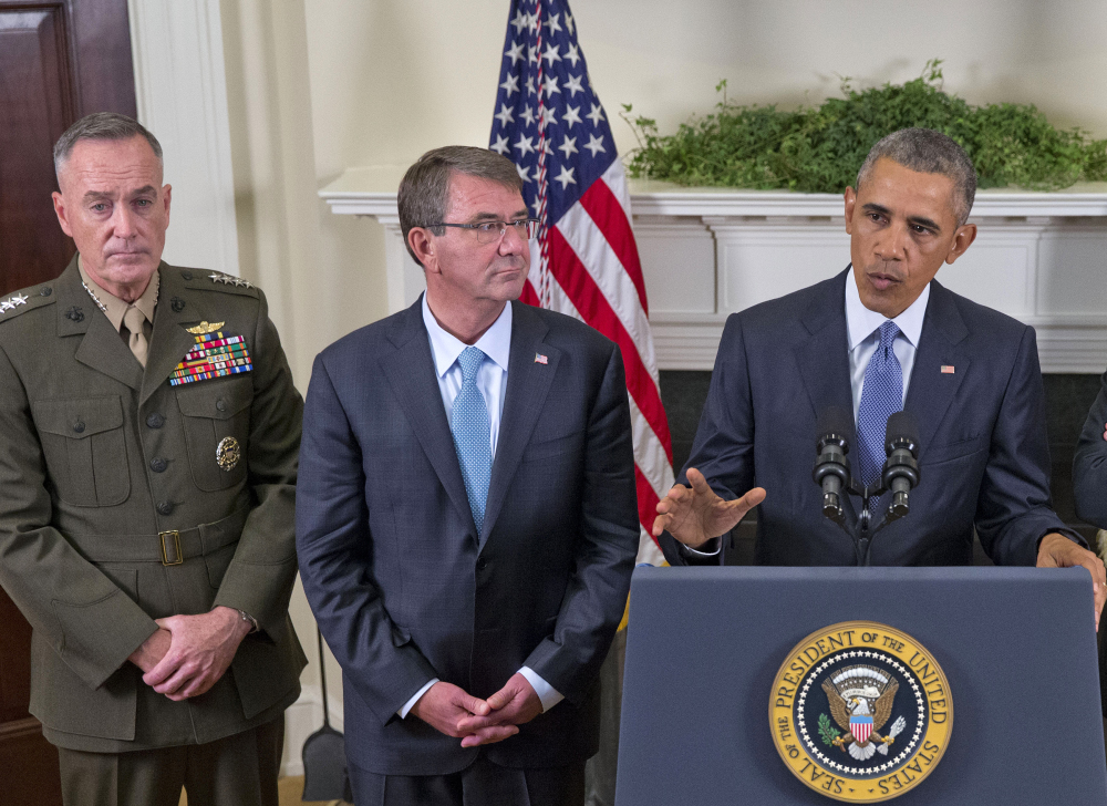 President Obama, accompanied by Joint Chiefs Chairman Gen. Joseph Dunford, left, and Defense Secretary Ash Carter on Thursday. Obama announced that he will keep U.S. troops in Afghanistan when he leaves office in 2017. The Associated Press