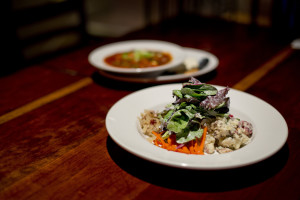 The Schwabish Salad, featuring house-pickled carrots, beets, potato salad, sauerkraut, and dressed greens, is one of the entrée offerings at Stirling & Mull in Freeport, Wednesday, October 14, 2015. Behind the salad is a dish of Hungarian goulash. Gabe Souza/Staff Photographer