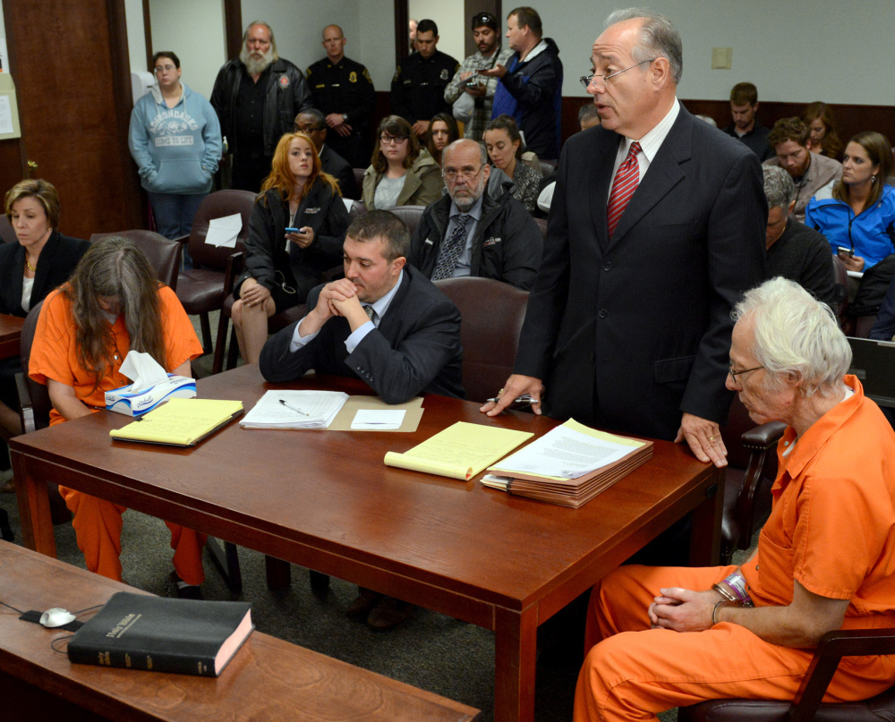 Deborah Leonard, left, and Bruce Leonard, right, sit next to their attorneys during a hearing Friday. The couple didn’t intend to seriously injure their sons in a church counseling session, the attorneys said Friday.
