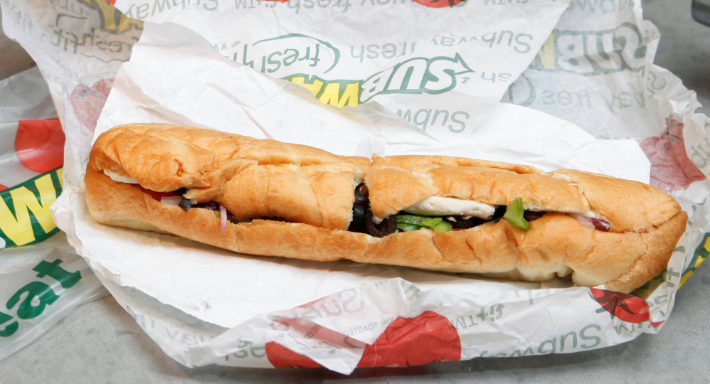 The Subway restaurant chain says it plans to switch to meat from animals raised without antibiotics over the next decade.