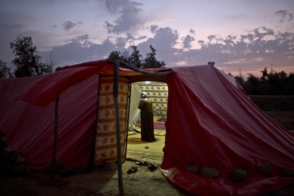 Many Syrian refugees who have fled fighting are living outdoors.
The Associated Press