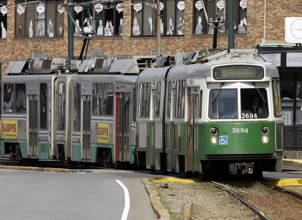 Boston’s MBTA is asking riders to weigh in on the exterior appearance of new train cars that it plans to add to its system to replace cars like these.