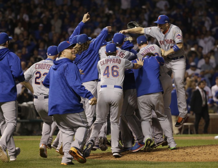 The Mets celebrate their first National League pennant in 15 years with Wednesday night’s 8-3 win at Chicago.