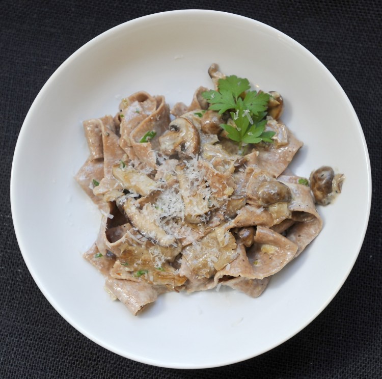 Acorn Taglietelle with Mushroom Cream Sauce garnished with grated Parmesan cheese and fresh parsley.
Gordon Chibroski/Staff Photographer