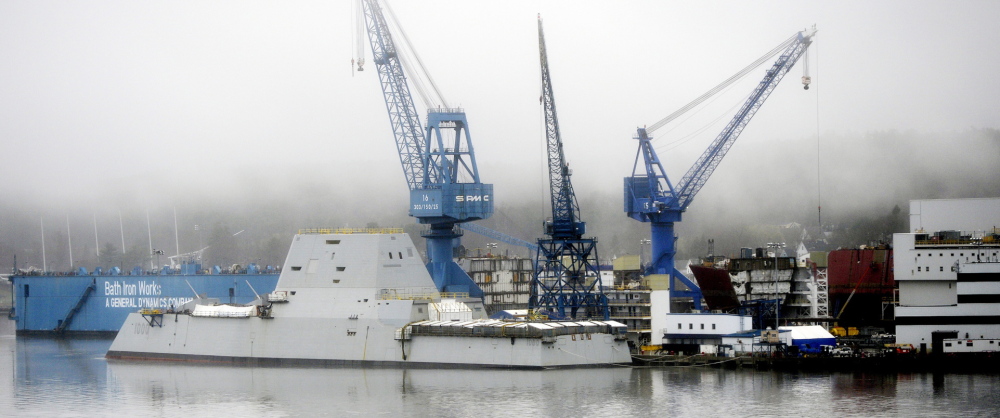 The annual defense funding bill included more than $1 billion for destroyers being built at Bath Iron Works, such as the USS Zumwalt, shown here under final construction. It also included changes that could lure development to the former Brunswick Naval Air Station.
