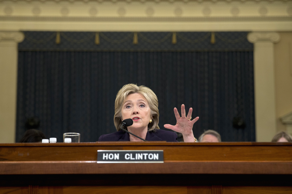 Former Secretary of State Hillary Clinton testifies Thursday during a House committee hearing on the attacks that killed four Americans at the Benghazi embassy in Libya in 2012.