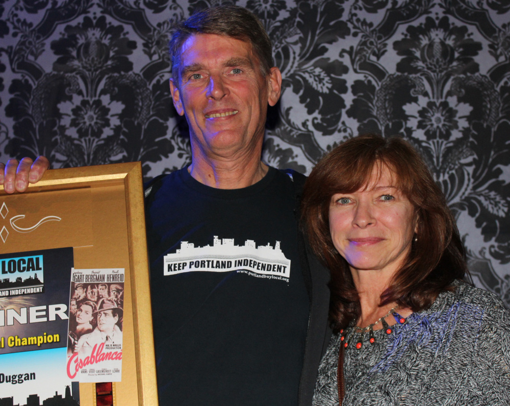 Buy Local Champion award recipient Bill Duggan with his wife, Yolanda Cherubin, who together owned Videoport.