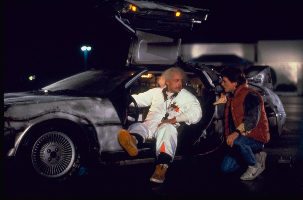 Christopher Lloyd, left, as inventor Doc Brown and Michael J. Fox as Marty McFly in “Back to the Future.”