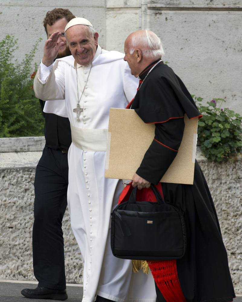 Pope Francis, center, seen with Cardinal Ricardo Ezzati Andrell at the Vatican for the synod of bishops, is facing stiff pressure for his reformist agenda.