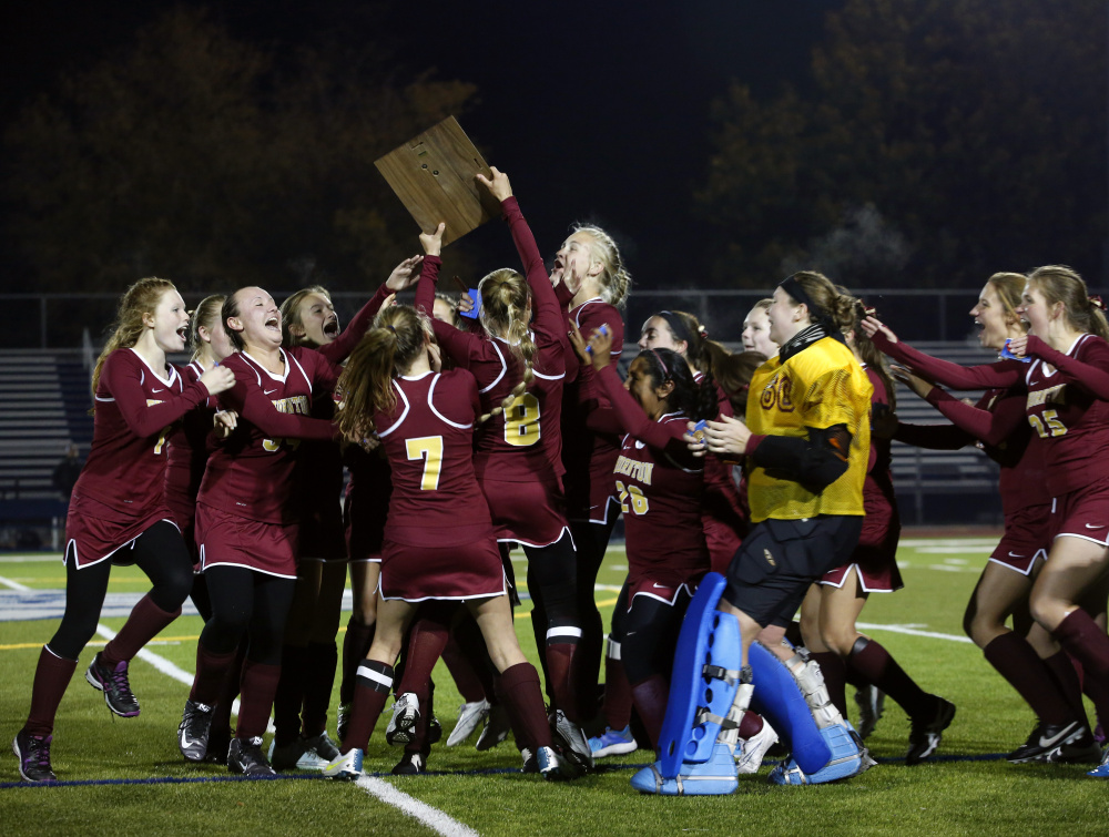 The Thornton Academy field hockey team celebrates its 4-1 win over Cheverus in the Class A South final Tuesday.