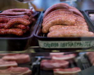 Chorizo and other sausages are on display in the butcher’s case at The Farm Stand in South Portland on Tuesday – tasty ingredients in a heated debate over a report that condemned processed meats.