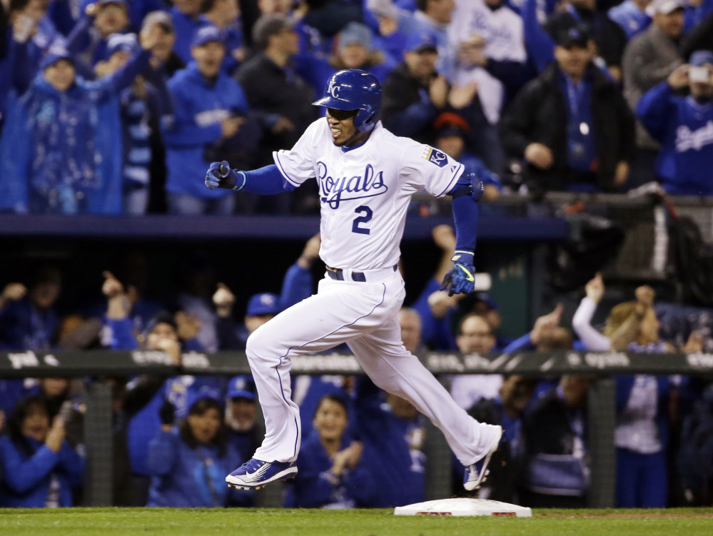 Kansas City’s Alcides Escobar rounds the bases on an inside-the-park home run leading off the first inning for the Royals.