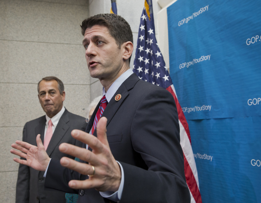 2013 Associated Press File Photo
Rep. Paul Ryan, R-Wis., right, is expected to win the spot being vacated by House Speaker John Boehner of Ohio, left.