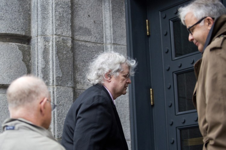Dr. Joel Sabean, a prominent South Portland dermatologist, enters court in October 2015 with attorneys Jay McCloskey and Thimi R. Mina. Sabean was back in court Tuesday for the start of his trial on charges of tax evasion, illegally distributing controlled substances and health care fraud.
