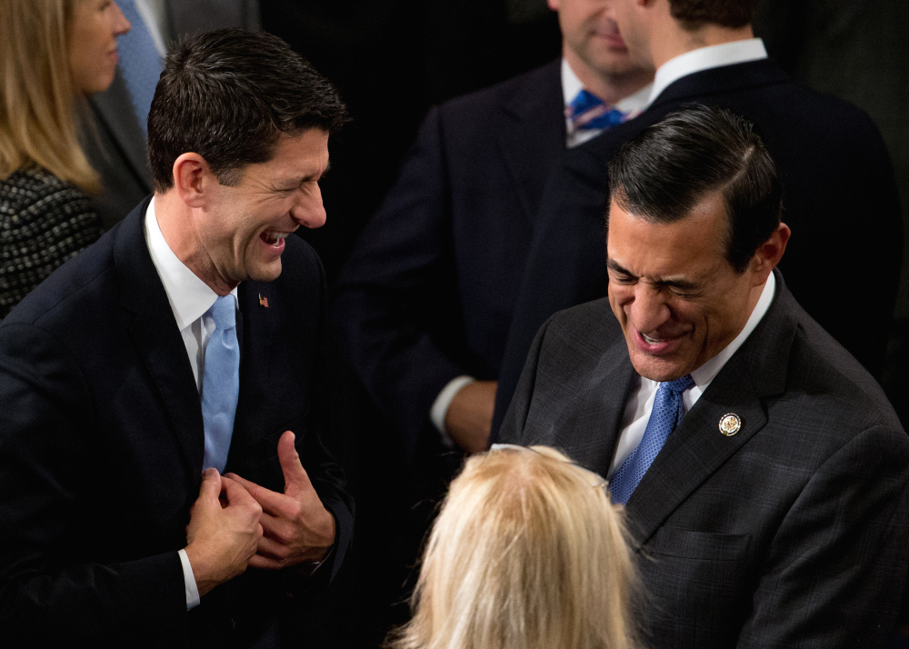 Rep. Paul Ryan, R-Wis., left, shares a laugh with Rep. Darrell Issa, R-Calif., in Washington on Thursday.