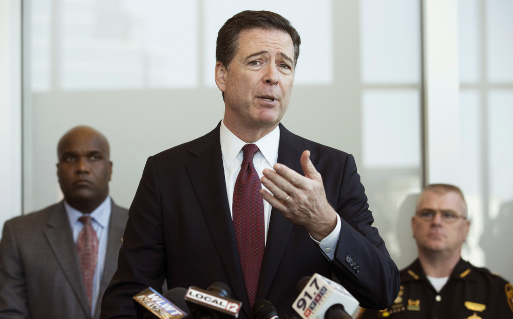 FBI Director James Comey raises the question of whether police officers are easing up on crime fighting for fear of being caught on camera.
The Associated Press
