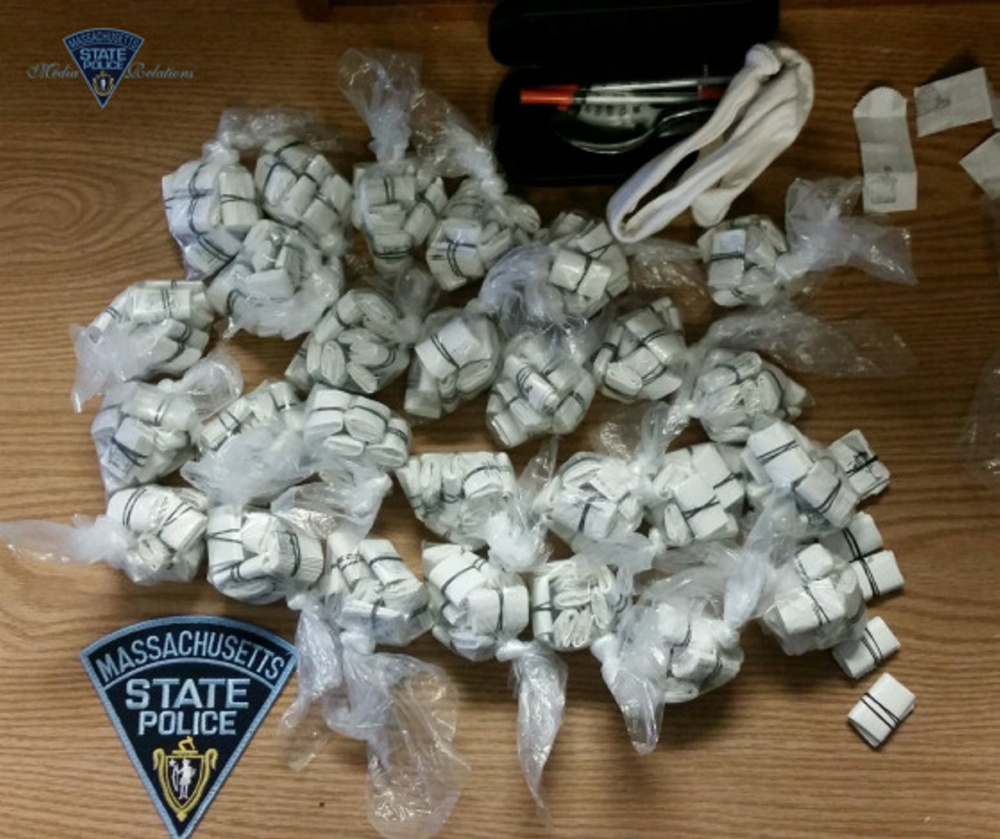 Massachusetts State Police say they found hundreds of bundles of heroin when they stopped a vehicle driven by Holly Grant of Palermo.