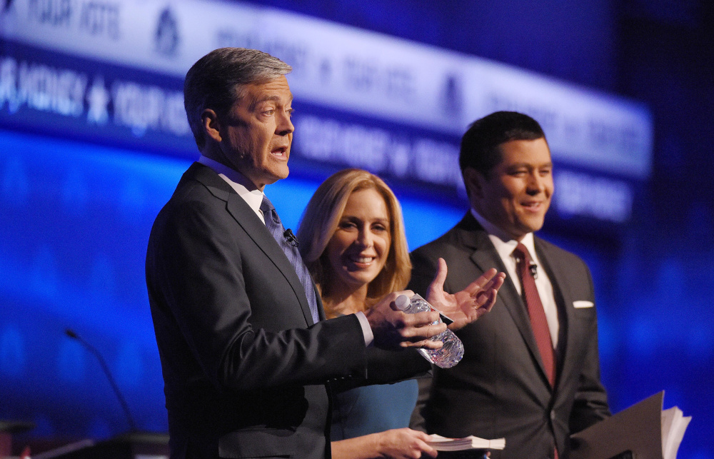 Debate moderators John Harwood, left, Becky Quick and Carl Quintanilla have been criticized for their handling of the CNBC Republican presidential debate Wednesday.