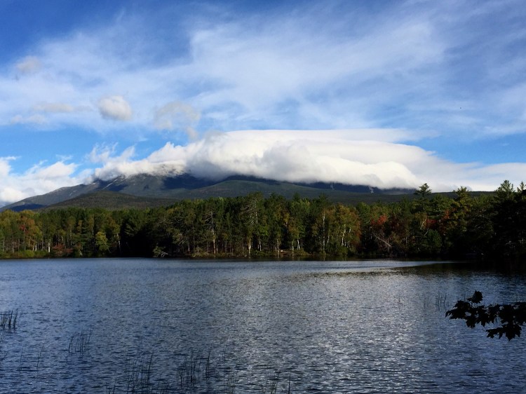 With temperatures in the teens, Mount Katahdin’s summit was enveloped in clouds early Friday morning, but that didn’t stop numerous Appalachian Trail "thru-hikers" from completing their hikes. The growing number of thru-hikers, and unruly behavior by a small number of them, has Baxter State Park officials concerned.