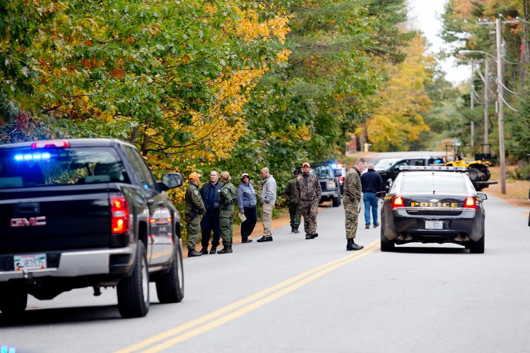 Police search off Maquoit Road in Brunswick for Lisa Marie Cox, 30, who was reported missing Monday. Gabe Souza/Staff Photographer 