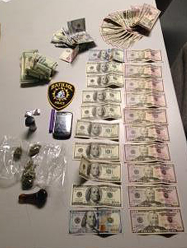 Money, drugs and perphenalia allegedly seized during the arrest of James Ezzell. Bath Police Department photo