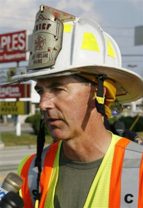 In this file photo, South Portland Fire Chief Kevin Guimond speaks July 17, 2010 about a plane crash on a road in South Portland. Courtesy photo