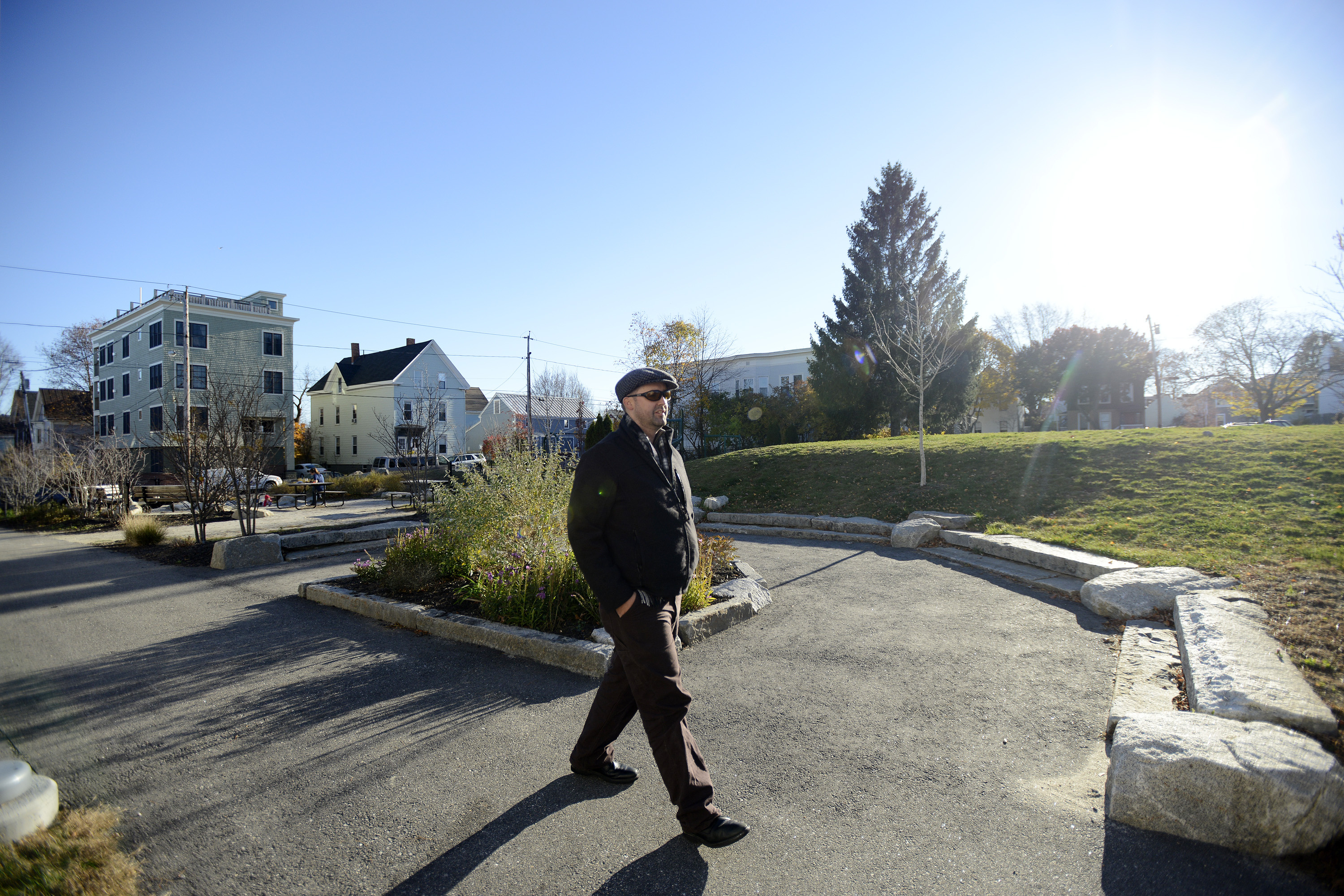 Kevin Donoghue walks in his Munjoy Hill neighborhood near Marada Adams Park