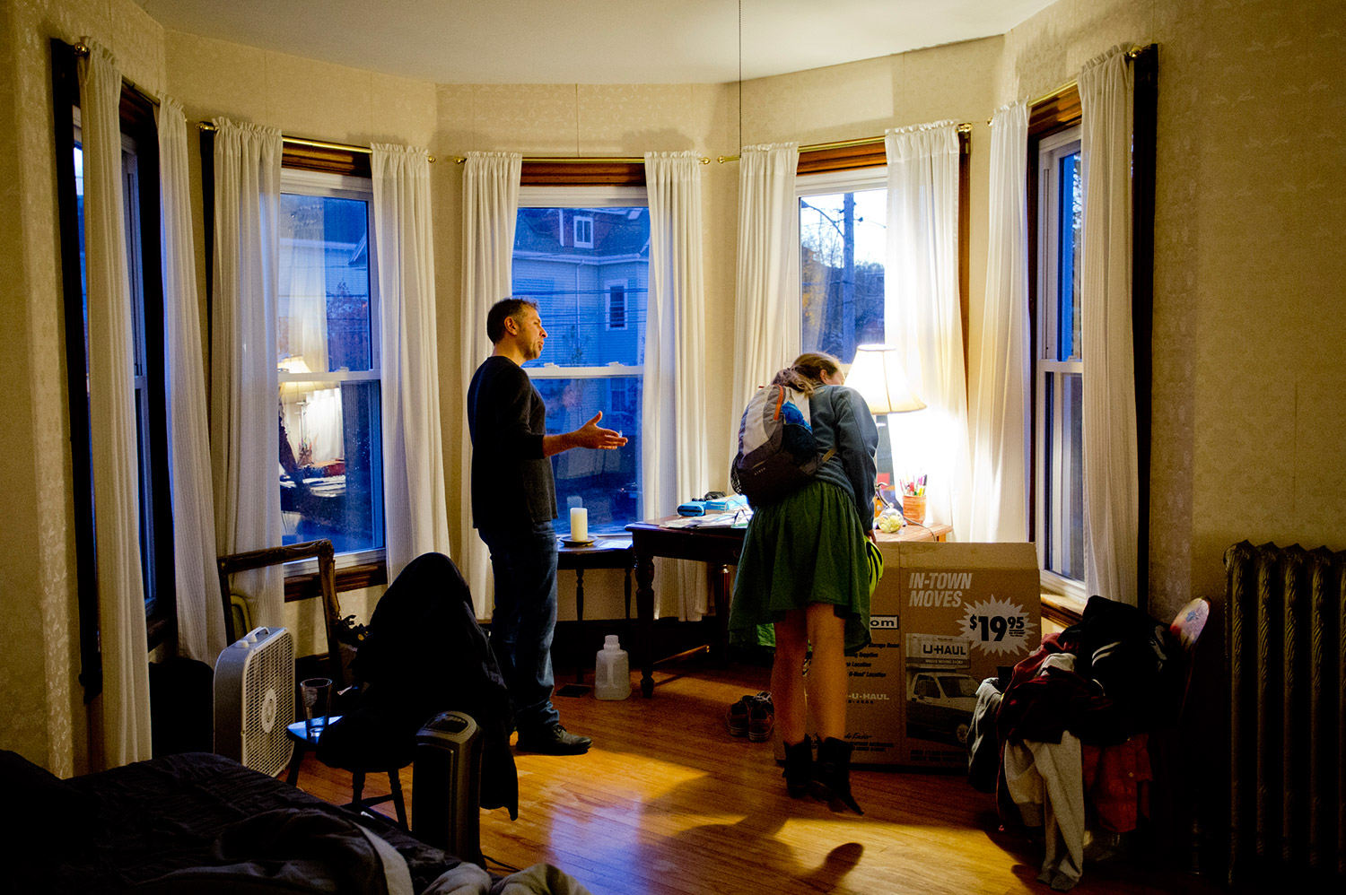 Pete Risano shows Maddie Purcell, 25, of Portland, a two-bedroom apartment for rent