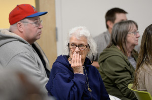 Lyndall Mink, 82, who lives at Franklin Towers, listens to residents speak during the meeting held Thursday by the Portland Housing Authority. People older than 60 comprise the largest portion of residents in the public housing complex.