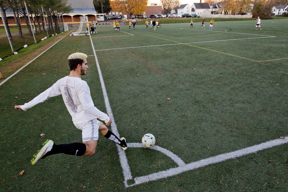 Alex Nason of Cheverus practices a corner kick on Tuesday in preparation for Wednesday’s Class A South final against Scarborough. The practice may come in handy as in last year’s regional final between the Red Storm and Stags all four regulation-time goals were from set pieces.