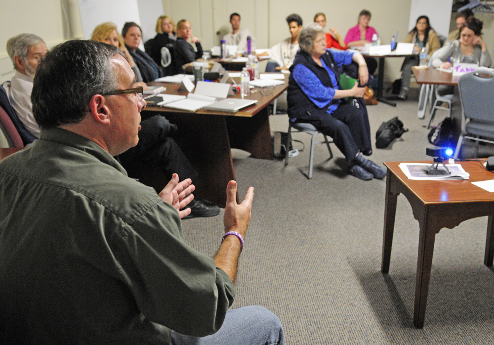 Darren Ripley, of the Maine Alliance for Addiction Recovery, talks during training for people volunteering as “angels” on Friday  at the Olde Federal Building in Augusta.
